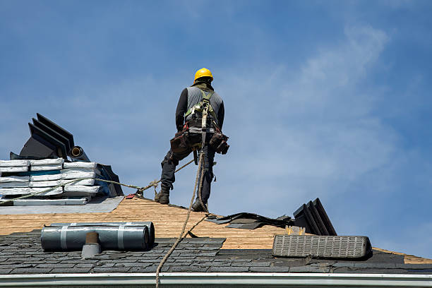 Professional Roof Replacement technician working in Sixes, OR